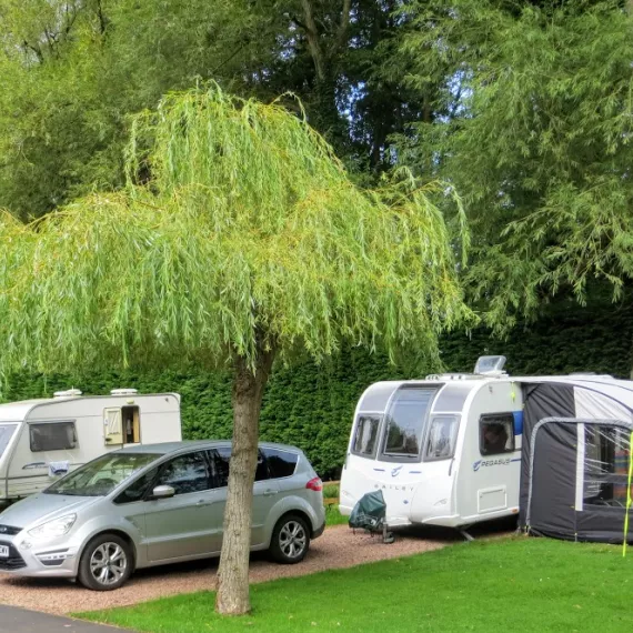 Touring car and caravan on new pitch