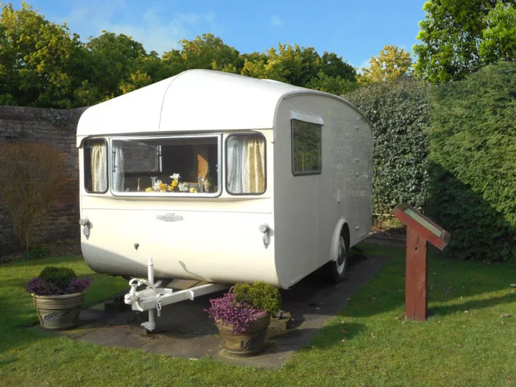 1955 Car Cruiser Clubman Four. The first caravan sold at Lickhill Manor Caravan Park in 1956. Purchased back by Hillandale Caravan Parks earlier this century and now on display at Lickhill Manor Caravan Park  